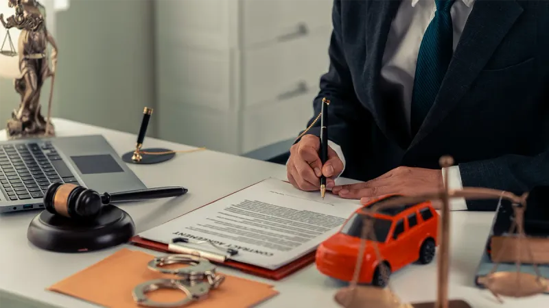 An Experienced Car Accident Lawyer Handling a Clients Case