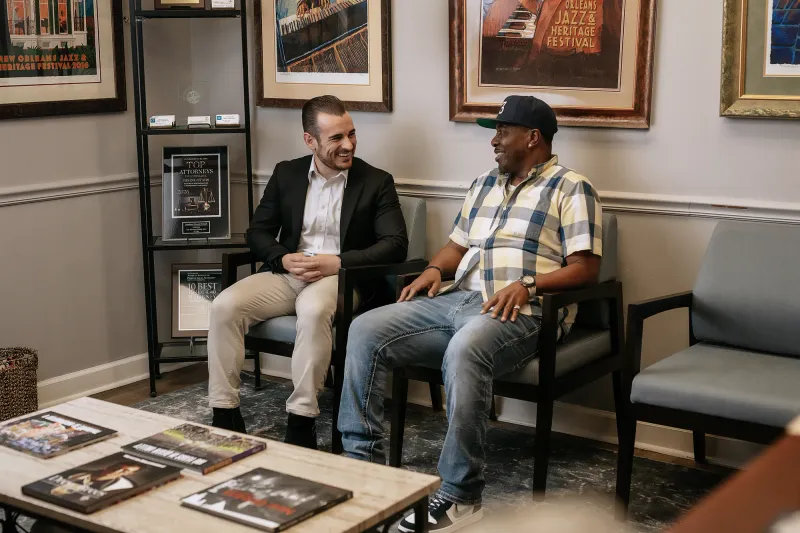 An attorney meeting a client in the consultation room