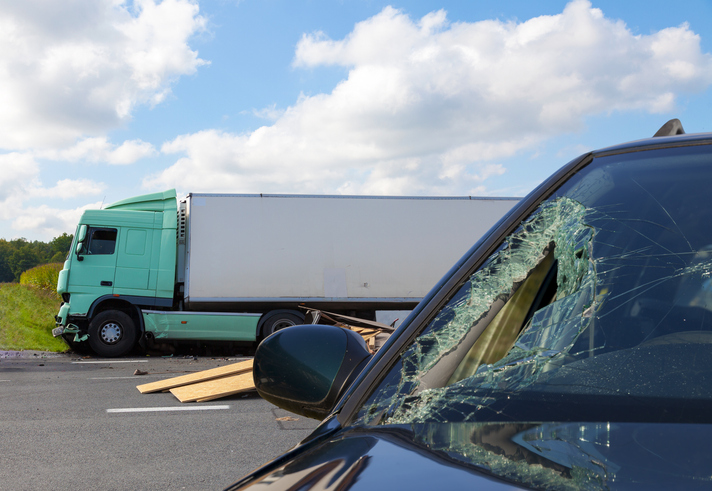 Truck and passenger car after a traffic accident